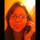 An Asian-American girl video-records her facial expressions as she takes a shit while talking to her friend on the telephone. Pooping sounds are clearly heard in the background.
